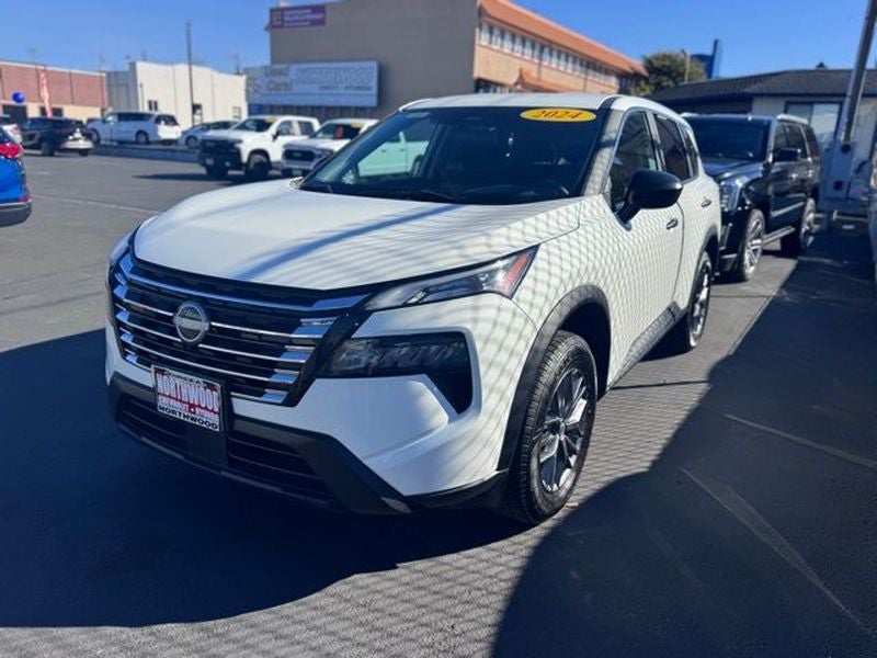 2024 Nissan Rogue S in Glacier White — front three-quarter view